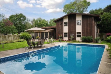 This classic mid-century modern home makes a dramatic statement on Brookview Golf Course - Brookview in Minnesota - for sale on GolfHomes.com, golf home, golf lot