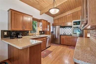 This classic mid-century modern home makes a dramatic statement on Brookview Golf Course - Brookview in Minnesota - for sale on GolfHomes.com, golf home, golf lot