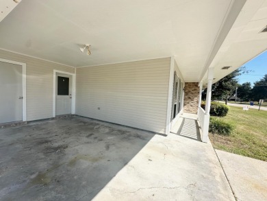 This beautifully, shaded corner lot, is located in a quiet on Bayou Country Club in Louisiana - for sale on GolfHomes.com, golf home, golf lot