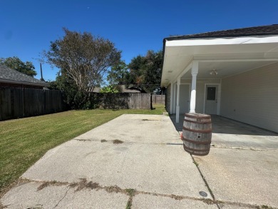 This beautifully, shaded corner lot, is located in a quiet on Bayou Country Club in Louisiana - for sale on GolfHomes.com, golf home, golf lot