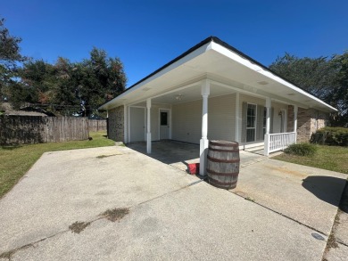 This beautifully, shaded corner lot, is located in a quiet on Bayou Country Club in Louisiana - for sale on GolfHomes.com, golf home, golf lot