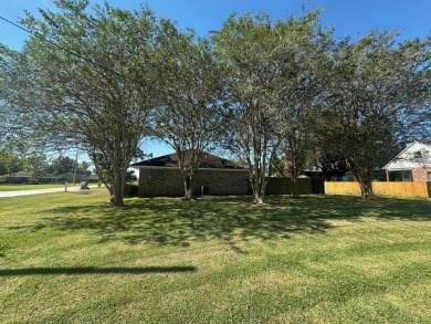 This beautifully, shaded corner lot, is located in a quiet on Bayou Country Club in Louisiana - for sale on GolfHomes.com, golf home, golf lot