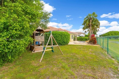 BEAUTIFUL PALM ISLES ESTATE HOME W/ GOLF AND LAKE VIEW. This on Keys Gate Golf Club in Florida - for sale on GolfHomes.com, golf home, golf lot