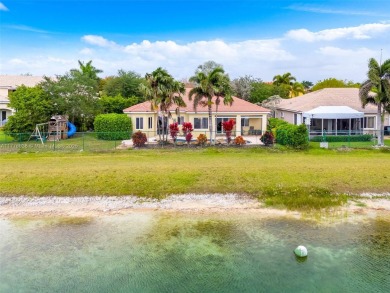 BEAUTIFUL PALM ISLES ESTATE HOME W/ GOLF AND LAKE VIEW. This on Keys Gate Golf Club in Florida - for sale on GolfHomes.com, golf home, golf lot