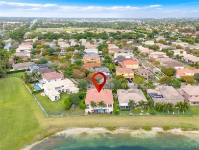 BEAUTIFUL PALM ISLES ESTATE HOME W/ GOLF AND LAKE VIEW. This on Keys Gate Golf Club in Florida - for sale on GolfHomes.com, golf home, golf lot