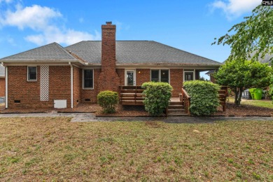 Welcome to this beautiful brick home situated on a large golf on The Woodlands Country Club in South Carolina - for sale on GolfHomes.com, golf home, golf lot