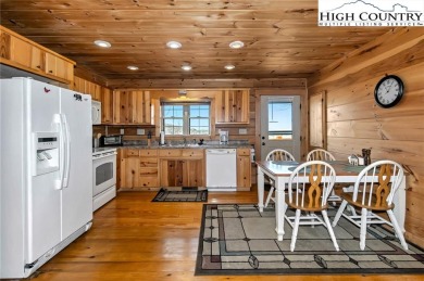 This beautifully maintained and furnished Blue Ridge Log Cabin on Beech Mountain Club in North Carolina - for sale on GolfHomes.com, golf home, golf lot