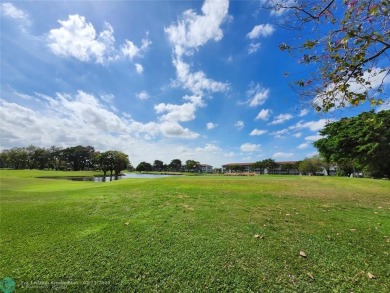 CENTURY VILLAGE----NEW HAMPTON---HOPA---THIS IS A 55 AND OLDER on Flamingo Lakes Country Club in Florida - for sale on GolfHomes.com, golf home, golf lot