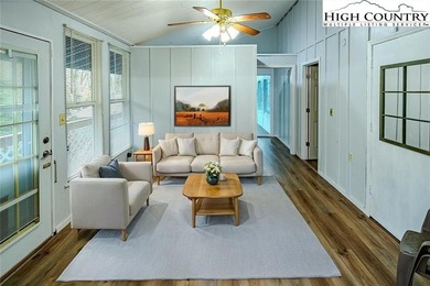 Blue Blue the sky is Blue and so is this house!!  Yep, and on Land Harbor Golf Course in North Carolina - for sale on GolfHomes.com, golf home, golf lot