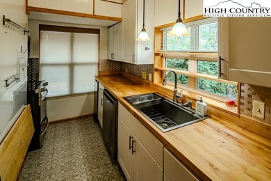 Blue Blue the sky is Blue and so is this house!!  Yep, and on Land Harbor Golf Course in North Carolina - for sale on GolfHomes.com, golf home, golf lot