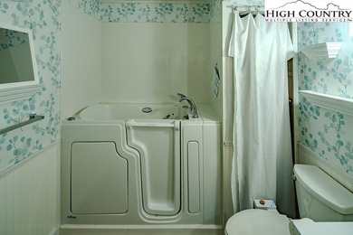 Blue Blue the sky is Blue and so is this house!!  Yep, and on Land Harbor Golf Course in North Carolina - for sale on GolfHomes.com, golf home, golf lot