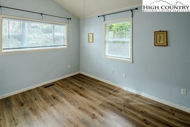 Blue Blue the sky is Blue and so is this house!!  Yep, and on Land Harbor Golf Course in North Carolina - for sale on GolfHomes.com, golf home, golf lot