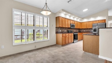 This one-of-a-kind 2,347 sq ft (2,092 + 255 sq ft BONUS ROOM) on Timber Greens Country Club in Florida - for sale on GolfHomes.com, golf home, golf lot