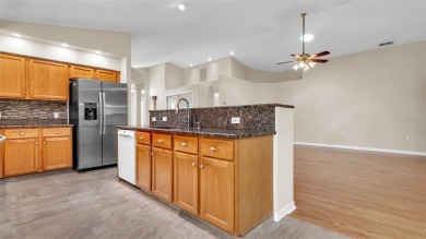 This one-of-a-kind 2,347 sq ft (2,092 + 255 sq ft BONUS ROOM) on Timber Greens Country Club in Florida - for sale on GolfHomes.com, golf home, golf lot