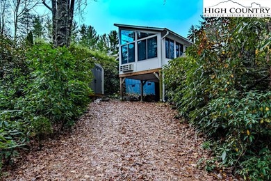 Blue Blue the sky is Blue and so is this house!!  Yep, and on Land Harbor Golf Course in North Carolina - for sale on GolfHomes.com, golf home, golf lot