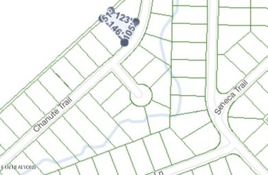 Discover a beautiful level wooded lot on a tar and chipped road on Lake Tansi Village Country Club in Tennessee - for sale on GolfHomes.com, golf home, golf lot