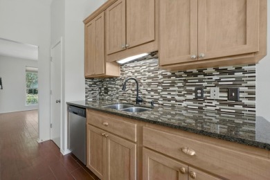 Welcome to a property that perfectly blends modern upgrades with on Fairway Oaks at Magnolia Golf Course in Florida - for sale on GolfHomes.com, golf home, golf lot