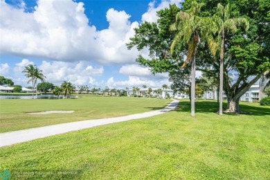 This is it! Absolutely stunning first-floor unit in sought-after on Atlantis Golf Club in Florida - for sale on GolfHomes.com, golf home, golf lot