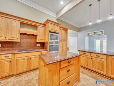 This spacious 5,233 sq. ft. home offers 5 bedrooms/ 4.5 baths in on Heritage Green  Golf Course in Alabama - for sale on GolfHomes.com, golf home, golf lot