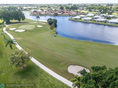 This is it! Absolutely stunning first-floor unit in sought-after on Atlantis Golf Club in Florida - for sale on GolfHomes.com, golf home, golf lot