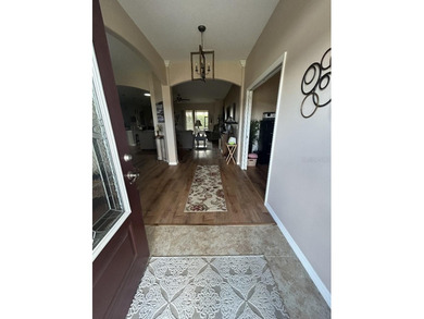 Beautifully maintained 4/3 with an office, brand new roof on Arlington Ridge Golf Club in Florida - for sale on GolfHomes.com, golf home, golf lot