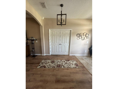 Beautifully maintained 4/3 with an office, brand new roof on Arlington Ridge Golf Club in Florida - for sale on GolfHomes.com, golf home, golf lot