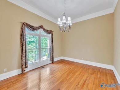 This spacious 5,233 sq. ft. home offers 5 bedrooms/ 4.5 baths in on Heritage Green  Golf Course in Alabama - for sale on GolfHomes.com, golf home, golf lot