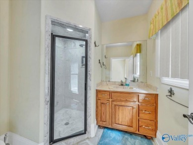 This spacious 5,233 sq. ft. home offers 5 bedrooms/ 4.5 baths in on Heritage Green  Golf Course in Alabama - for sale on GolfHomes.com, golf home, golf lot