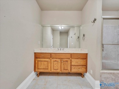 This spacious 5,233 sq. ft. home offers 5 bedrooms/ 4.5 baths in on Heritage Green  Golf Course in Alabama - for sale on GolfHomes.com, golf home, golf lot