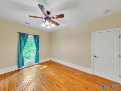 This spacious 5,233 sq. ft. home offers 5 bedrooms/ 4.5 baths in on Heritage Green  Golf Course in Alabama - for sale on GolfHomes.com, golf home, golf lot