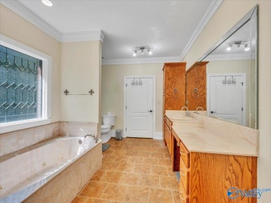 This spacious 5,233 sq. ft. home offers 5 bedrooms/ 4.5 baths in on Heritage Green  Golf Course in Alabama - for sale on GolfHomes.com, golf home, golf lot