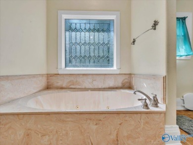 This spacious 5,233 sq. ft. home offers 5 bedrooms/ 4.5 baths in on Heritage Green  Golf Course in Alabama - for sale on GolfHomes.com, golf home, golf lot