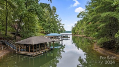 Embrace the ultimate lakefront lifestyle in this extraordinary on Marion Lake Club in North Carolina - for sale on GolfHomes.com, golf home, golf lot