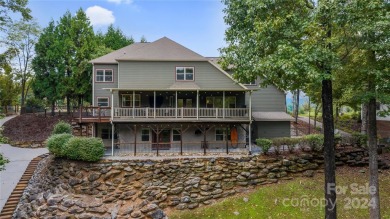 Embrace the ultimate lakefront lifestyle in this extraordinary on Marion Lake Club in North Carolina - for sale on GolfHomes.com, golf home, golf lot