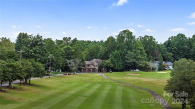 Embrace the ultimate lakefront lifestyle in this extraordinary on Marion Lake Club in North Carolina - for sale on GolfHomes.com, golf home, golf lot