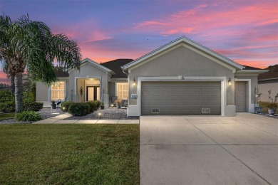 Right out of a magazine, this stunning  HANOVER sits on a 1/3 on Eagle Ridge At Spruce Creek Country Club in Florida - for sale on GolfHomes.com, golf home, golf lot