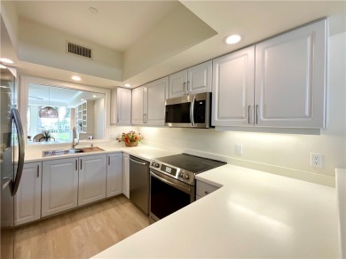 Delightful transformation of a lakefront 2/2 condo in Vero's on Oak Harbor Country Club in Florida - for sale on GolfHomes.com, golf home, golf lot
