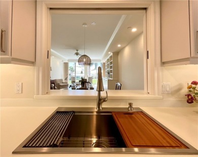 Delightful transformation of a lakefront 2/2 condo in Vero's on Oak Harbor Country Club in Florida - for sale on GolfHomes.com, golf home, golf lot