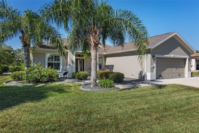 Right out of a magazine, this stunning  HANOVER sits on a 1/3 on Eagle Ridge At Spruce Creek Country Club in Florida - for sale on GolfHomes.com, golf home, golf lot