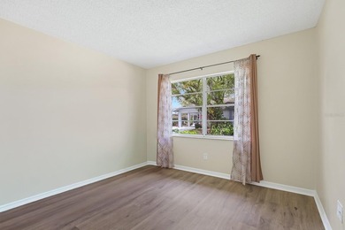 Located in the gated and guard-attended Kings Point community on Falcon Watch Golf Club in Florida - for sale on GolfHomes.com, golf home, golf lot