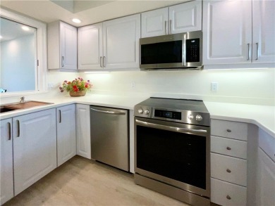 Delightful transformation of a lakefront 2/2 condo in Vero's on Oak Harbor Country Club in Florida - for sale on GolfHomes.com, golf home, golf lot