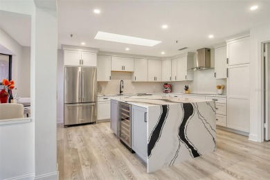 Located in the highly sought-after Harbour Oaks community on on Longboat Key Golf Club Resort in Florida - for sale on GolfHomes.com, golf home, golf lot