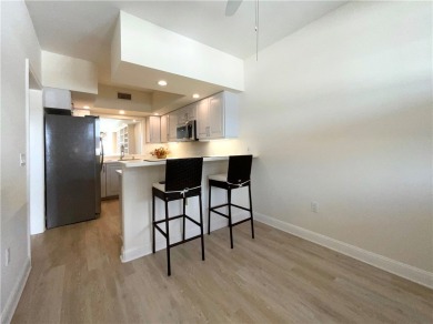Delightful transformation of a lakefront 2/2 condo in Vero's on Oak Harbor Country Club in Florida - for sale on GolfHomes.com, golf home, golf lot