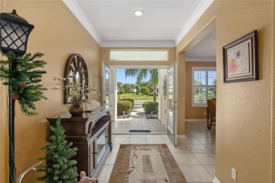 Right out of a magazine, this stunning  HANOVER sits on a 1/3 on Eagle Ridge At Spruce Creek Country Club in Florida - for sale on GolfHomes.com, golf home, golf lot