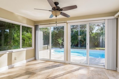 This beautifully updated three-bedroom, two-bathroom pool home on Largo Golf Course in Florida - for sale on GolfHomes.com, golf home, golf lot