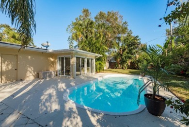 This beautifully updated three-bedroom, two-bathroom pool home on Largo Golf Course in Florida - for sale on GolfHomes.com, golf home, golf lot