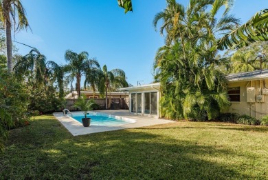 This beautifully updated three-bedroom, two-bathroom pool home on Largo Golf Course in Florida - for sale on GolfHomes.com, golf home, golf lot