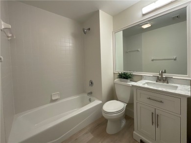 Delightful transformation of a lakefront 2/2 condo in Vero's on Oak Harbor Country Club in Florida - for sale on GolfHomes.com, golf home, golf lot
