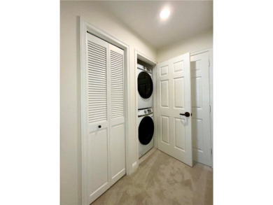 Delightful transformation of a lakefront 2/2 condo in Vero's on Oak Harbor Country Club in Florida - for sale on GolfHomes.com, golf home, golf lot