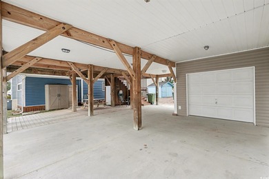 Discover your perfect getaway in the prestigious gated community on Prestwick Country Club in South Carolina - for sale on GolfHomes.com, golf home, golf lot